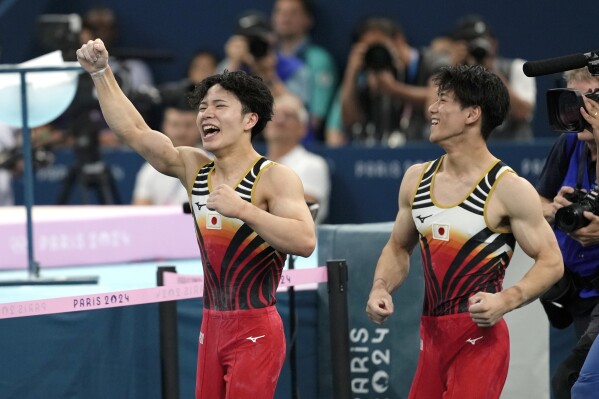 日本选手冈真之助获得男子全能冠军。卫冕奥运冠军桥下彻步履蹒跚